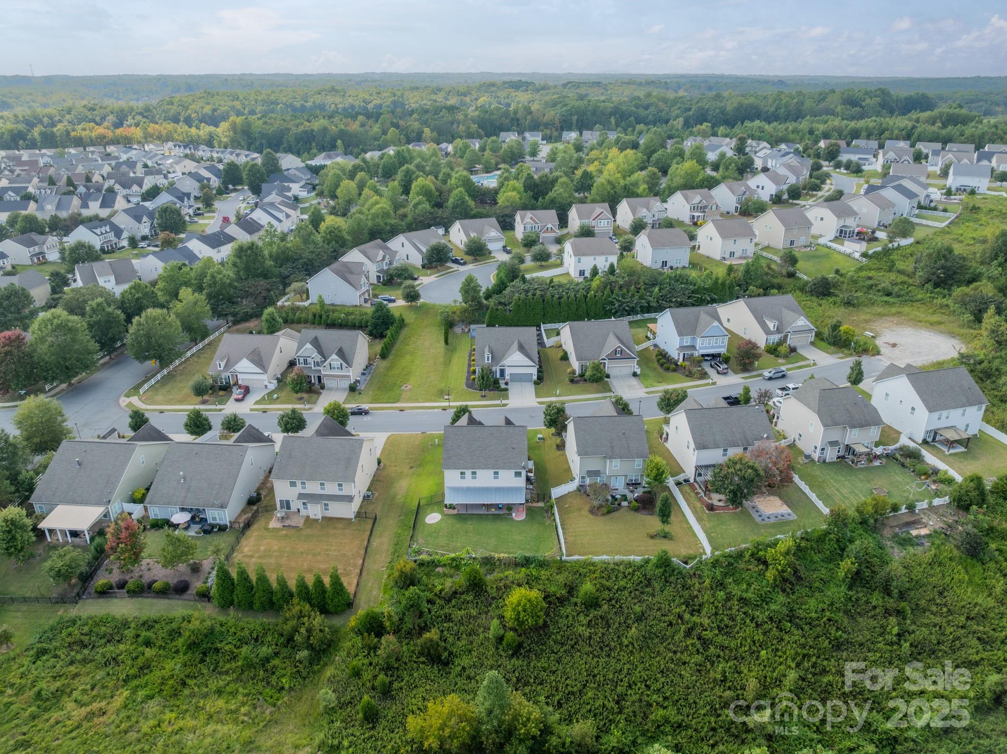 3419 Streamside Drive, Unit 463 Davidson, NC 28036 - Photo 29 of 43 an aerial view of multiple house
