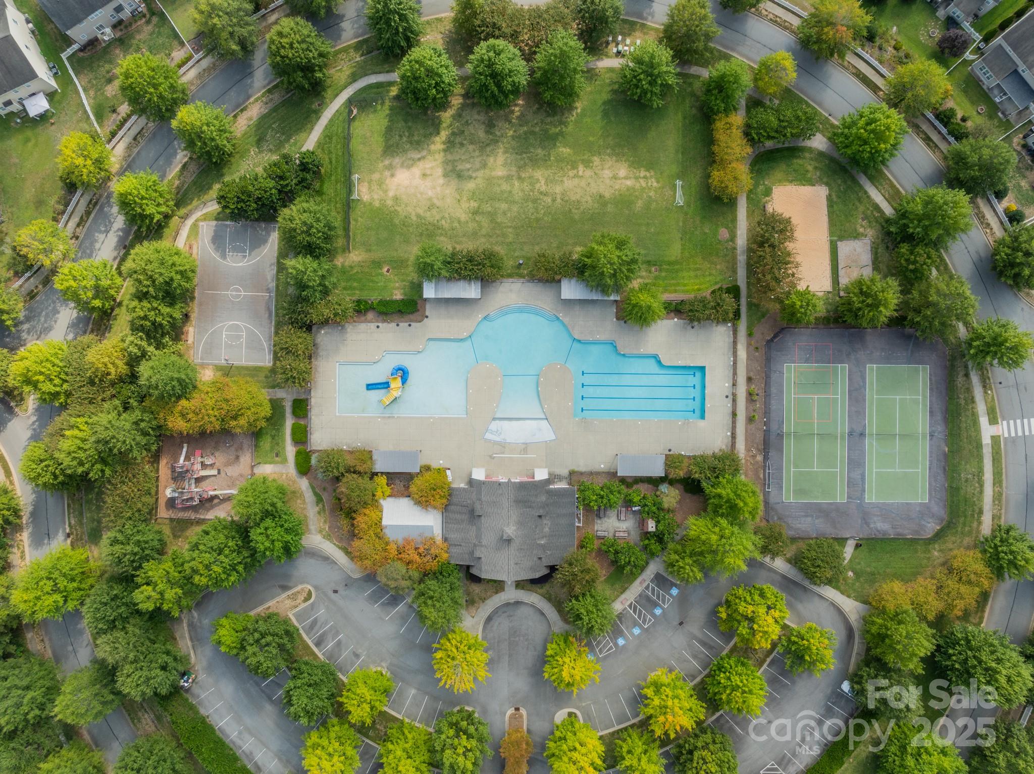 3419 Streamside Drive, Unit 463 Davidson, NC 28036 - Photo 32 of 43 an aerial view of a house with a yard