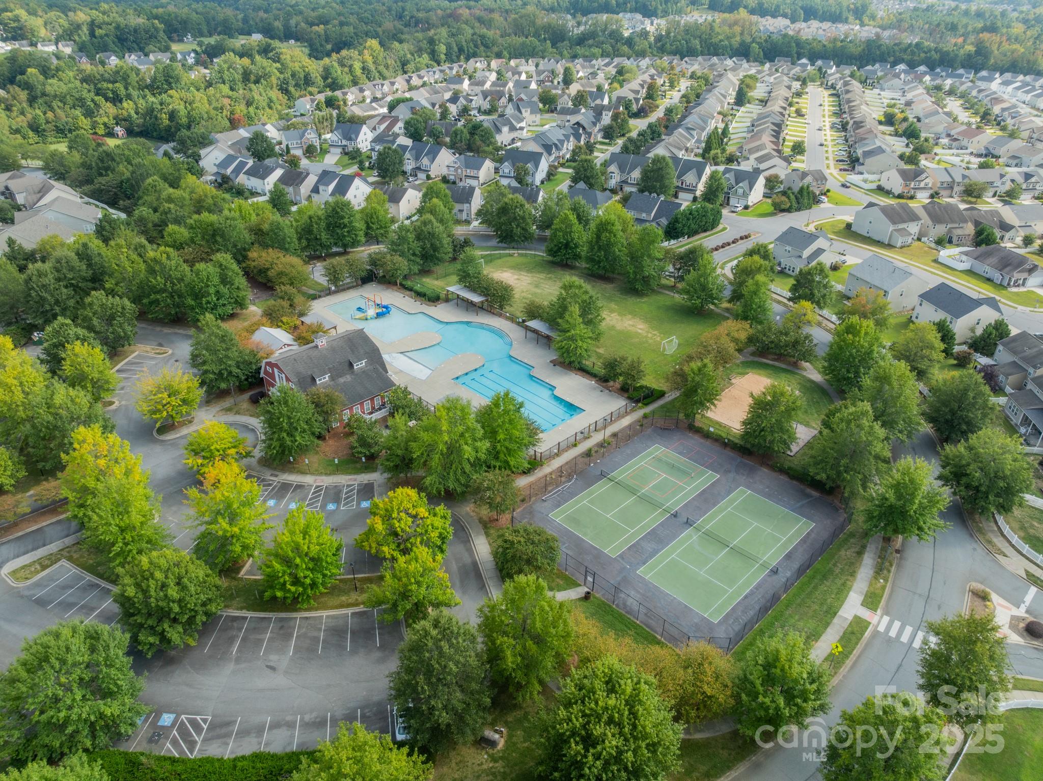 3419 Streamside Drive, Unit 463 Davidson, NC 28036 - Photo 33 of 43 an aerial view of a house with a yard