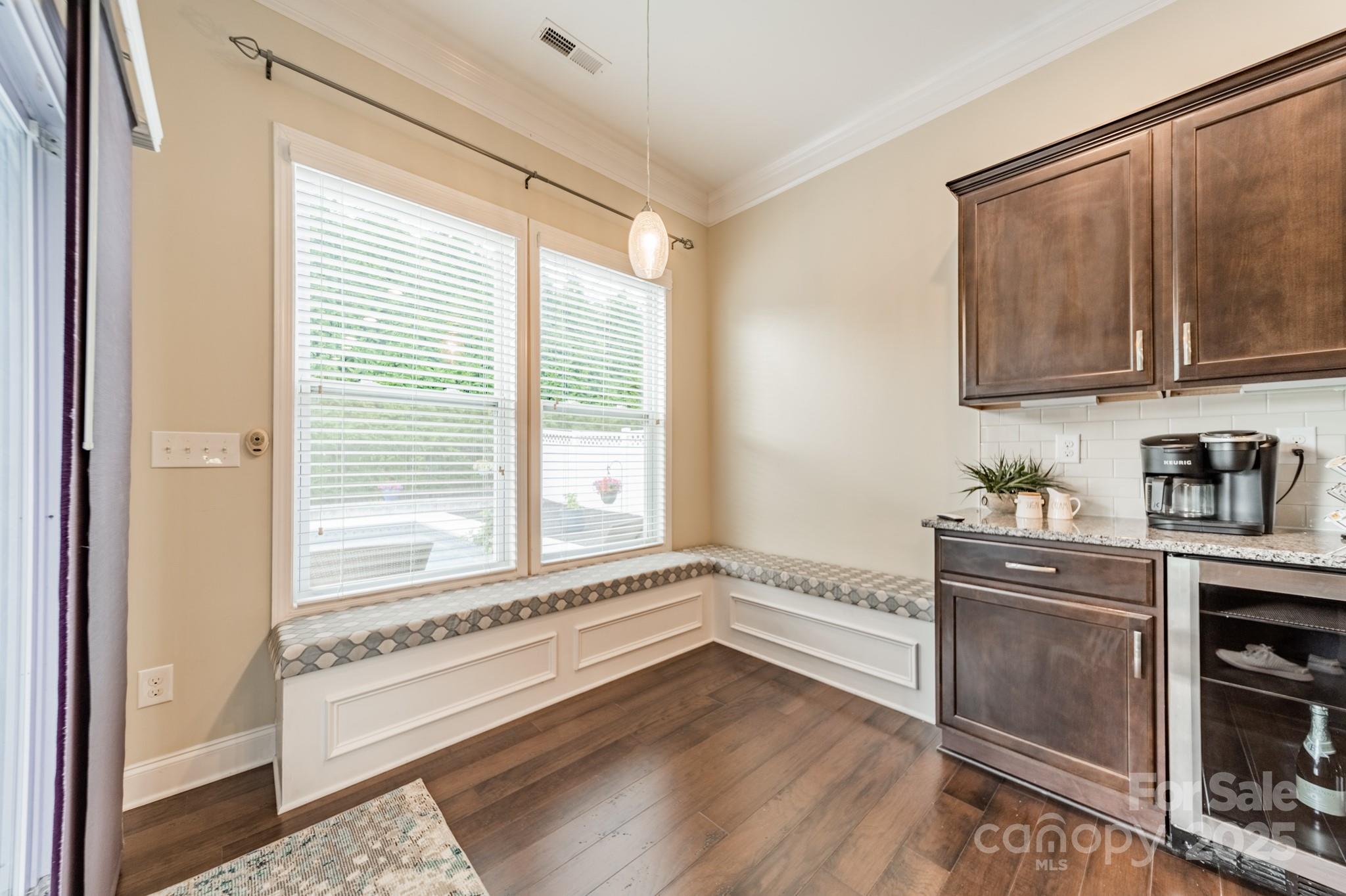 3419 Streamside Drive, Unit 463 Davidson, NC 28036 - Photo 8 of 43 a view of a kitchen with a sink cabinets and outdoor space