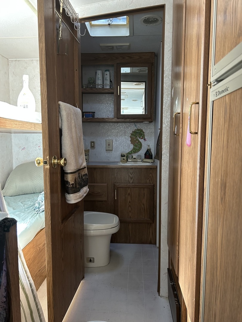 6-19 Woodhaven Lakes Sublette, IL 61367 - Photo 17 of 24 a bathroom with a toilet and a sink