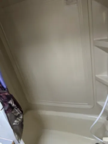 a bathroom with bathtub