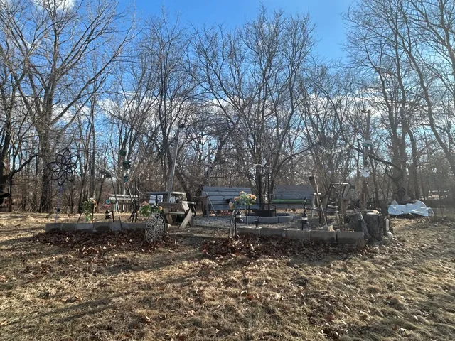 a backyard of a house with lots of green space
