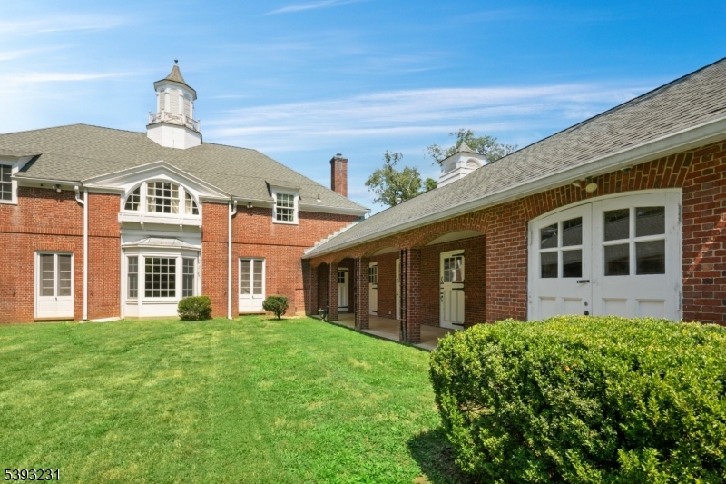 49 Liberty Corner Road Bernards, NJ 07931 - Photo 19 of 23 a front view of a house with a yard