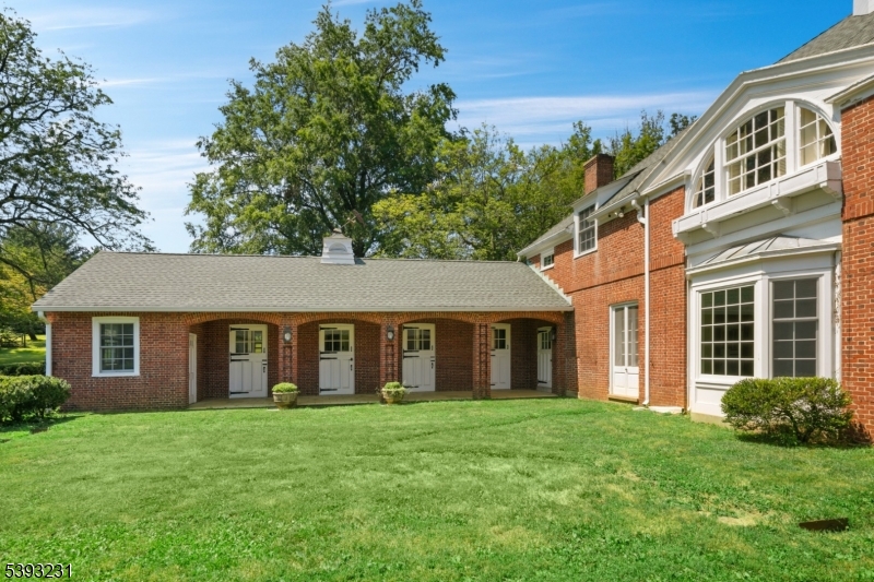 49 Liberty Corner Road Bernards, NJ 07931 - Photo 21 of 23 front view of a house with a yard