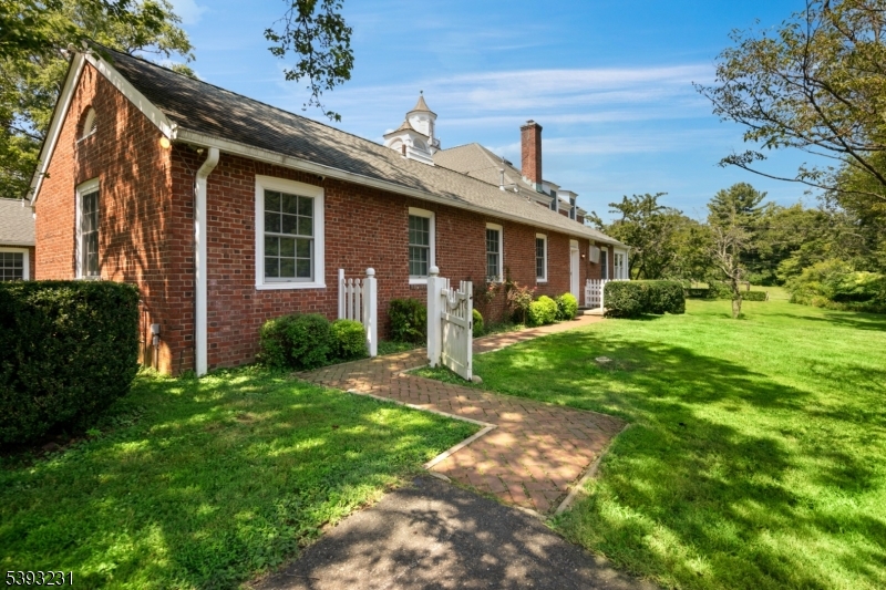 49 Liberty Corner Road Bernards, NJ 07931 - Photo 23 of 23 a front view of a house with garden