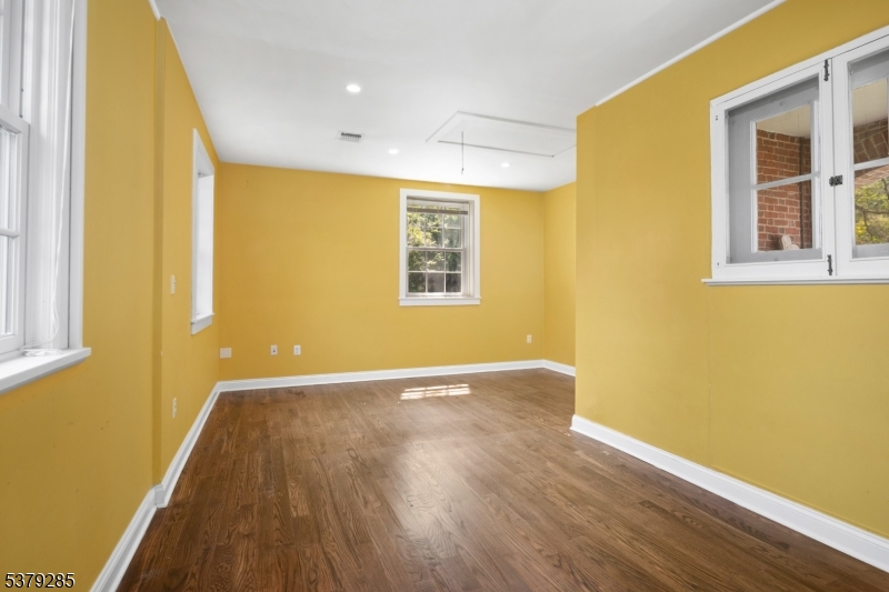 49 Liberty Corner Road Bernards, NJ 07931 - Photo 26 of 50 a view of an empty room with wooden floor and a window