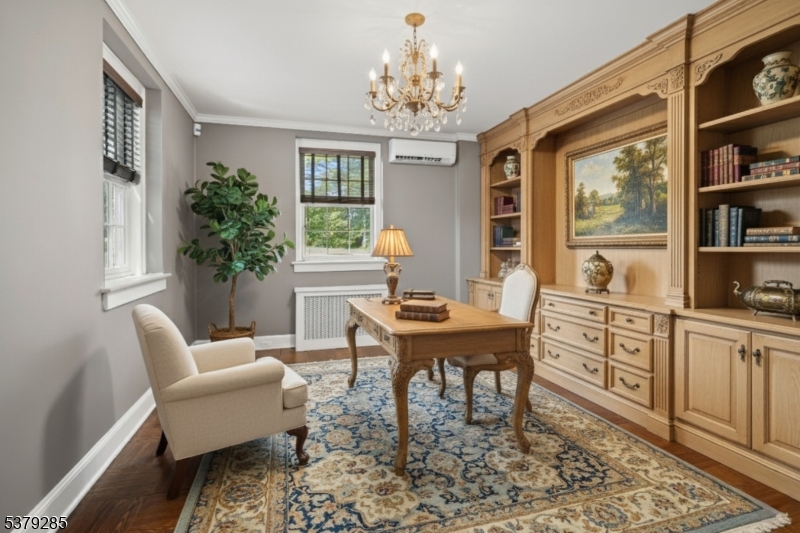 49 Liberty Corner Road Bernards, NJ 07931 - Photo 30 of 50 a dining room with furniture a rug and wooden floor
