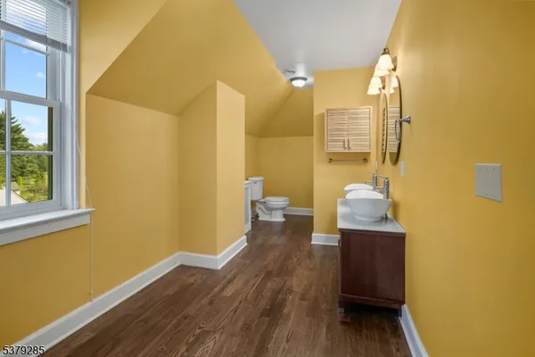 a view of a bathroom with a tub and shower curtain
