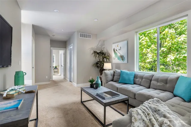 a bathroom with a double vanity sink toilet mirror and bathtub