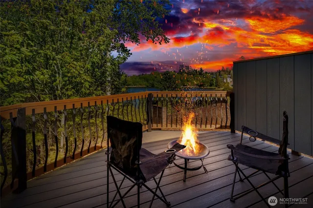 a bathroom with a double vanity sink mirror and shower