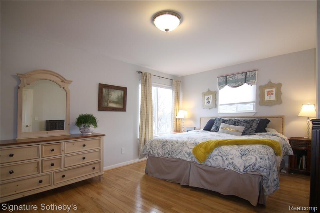 130 North Helen Avenue Rochester, MI 48307 - Photo 19 of 34 Master bedroom with beautiful hardwood floors and a large walk in closet