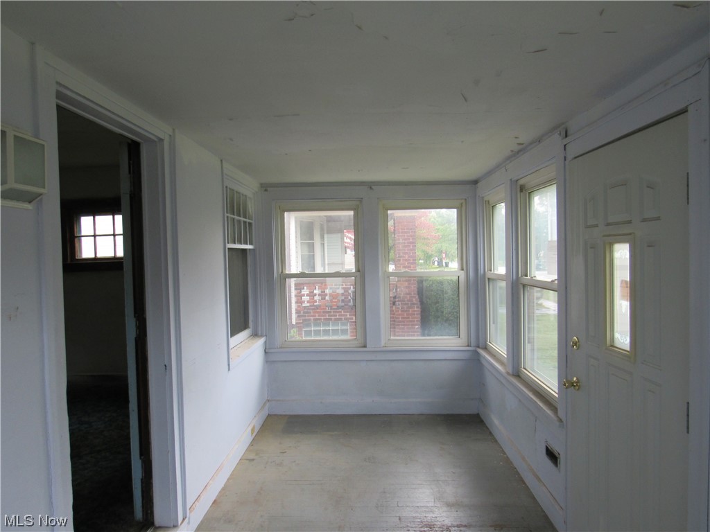 17815 Olympia Road Cleveland, OH 44112 - Photo 7 of 27 View of unfurnished sunroom