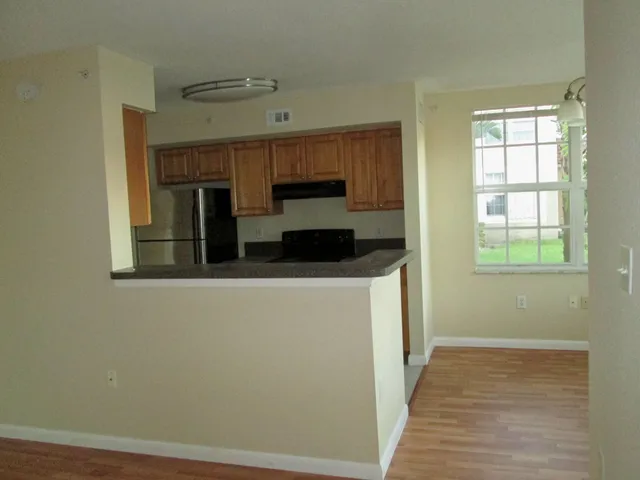 a view of kitchen and front door