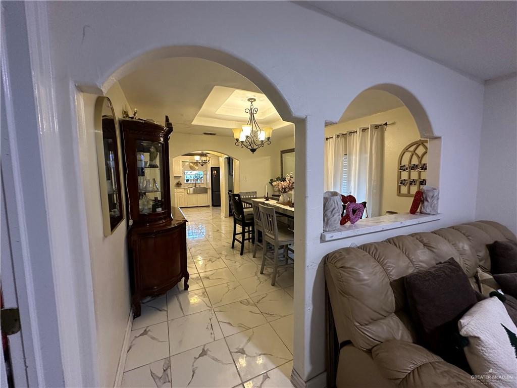 1513 North View Lane Mission, TX 78573 - Photo 11 of 24 a living room with furniture and a large window