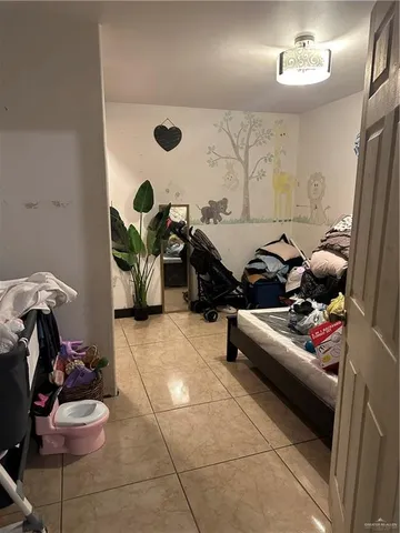 a bathroom with toilet sink and mirror