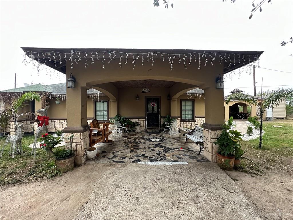 1513 North View Lane Mission, TX 78573 - Photo 2 of 24 a view of a patio with table and chairs