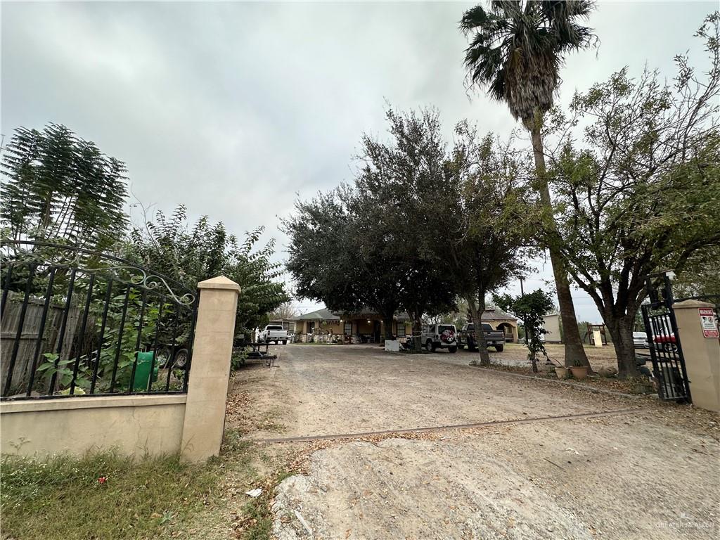 1513 North View Lane Mission, TX 78573 - Photo 24 of 24 a view of outdoor space with garden and trees