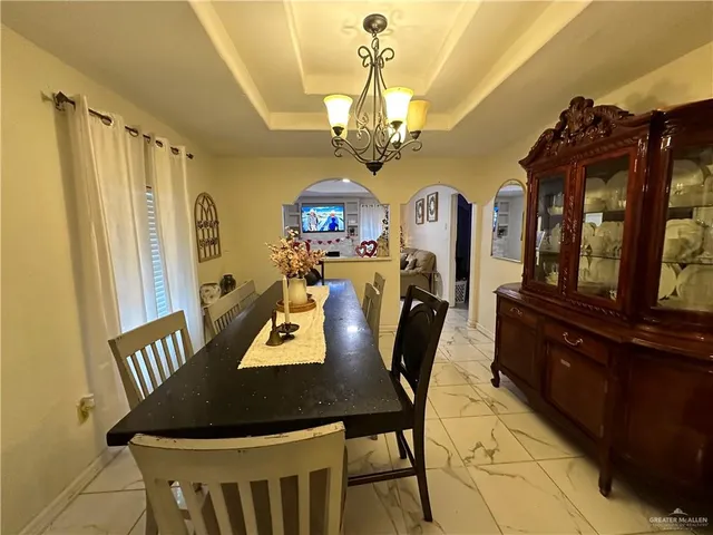a view of a dining room with furniture