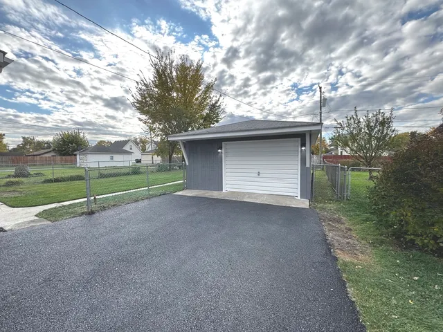 a view of backyard with green space