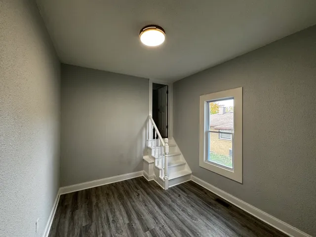 an empty room with windows