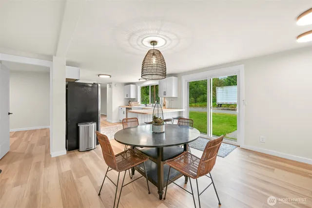 a view of a dining room with furniture