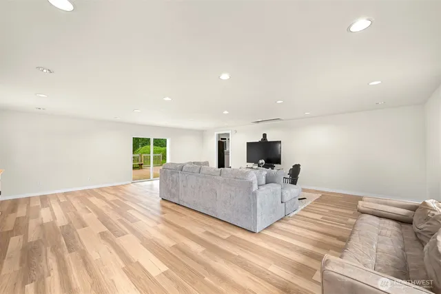 a bedroom with a bed and a view of bathroom