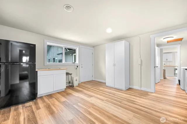 a view of a livingroom with wooden floor