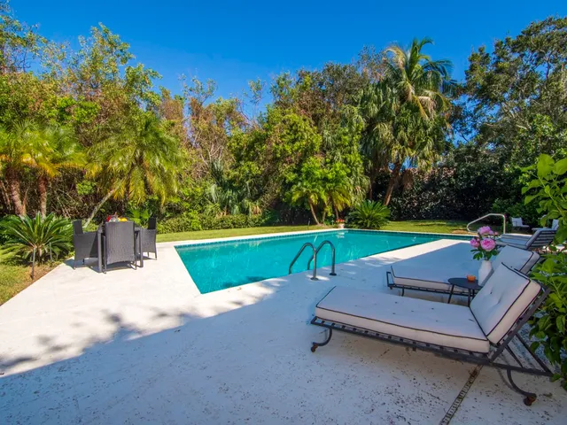 a park view with a sitting space and garden