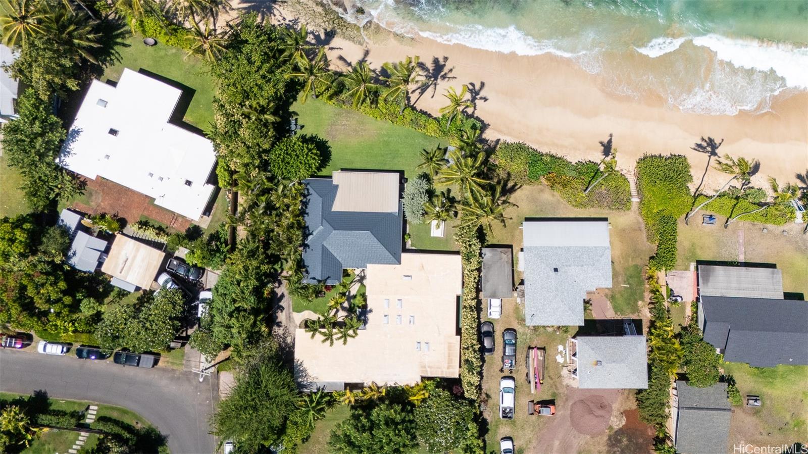 61-707 Papailoa Road Haleiwa, HI 96712 - Photo 25 of 25 From above, you can clearly see the expansive, wide yard, the total privacy afforded by the corner lot, and the two distinct living areas distinguished by their different roof colors.North Shore Haleiwa Hawaii.