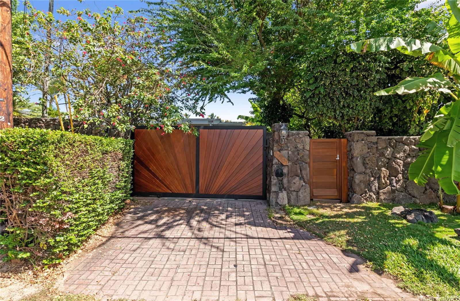 61-707 Papailoa Road Haleiwa, HI 96712 - Photo 5 of 25 Custom made wood entry gates allow total privacy. North Shore Haleiwa Hawaii.
