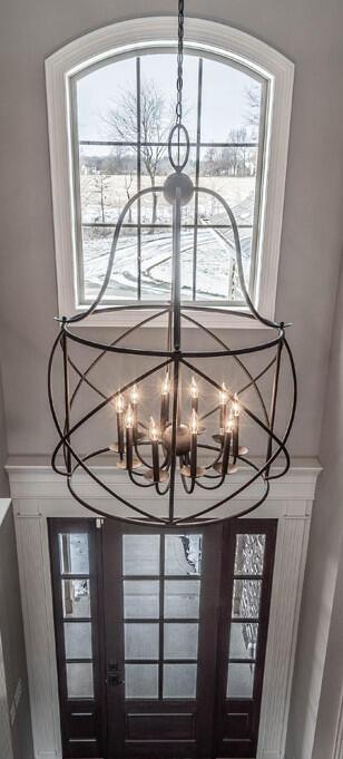 4459 Green Cook Road Johnstown, OH 43031 - Photo 54 of 103 ORNATE IRON CHANDELIER LIGHING THE GRAND FOYER