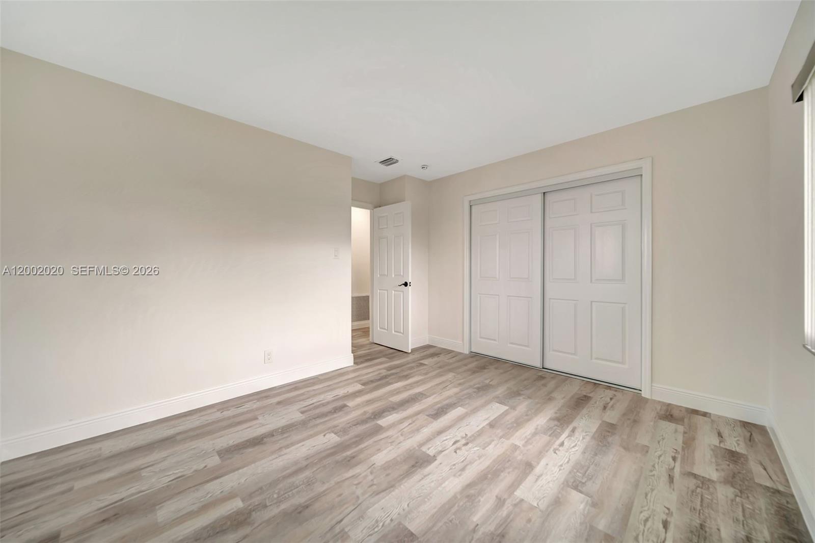 8502 Northwest 59th Street Tamarac, FL 33321 - Photo 16 of 18 a view of an empty room