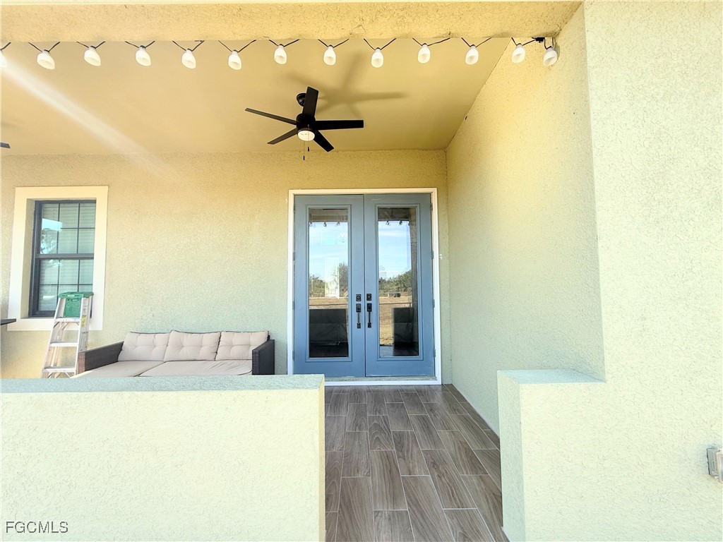 338 Partridge Street Lehigh Acres, FL 33974 - Photo 13 of 30 a living room with a couch