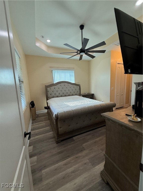 338 Partridge Street Lehigh Acres, FL 33974 - Photo 26 of 30 a bedroom with a bed and a flat screen tv