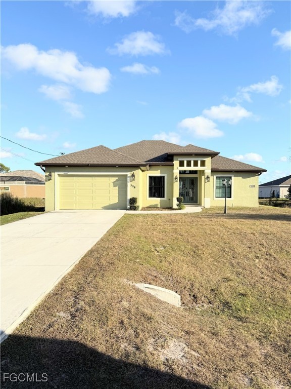 338 Partridge Street Lehigh Acres, FL 33974 - Photo 3 of 30 a view of house with outdoor space