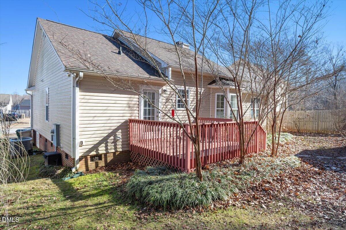 130 Muirfield Ridge Drive Garner, NC 27529 - Photo 19 of 29 a view of a house with a yard