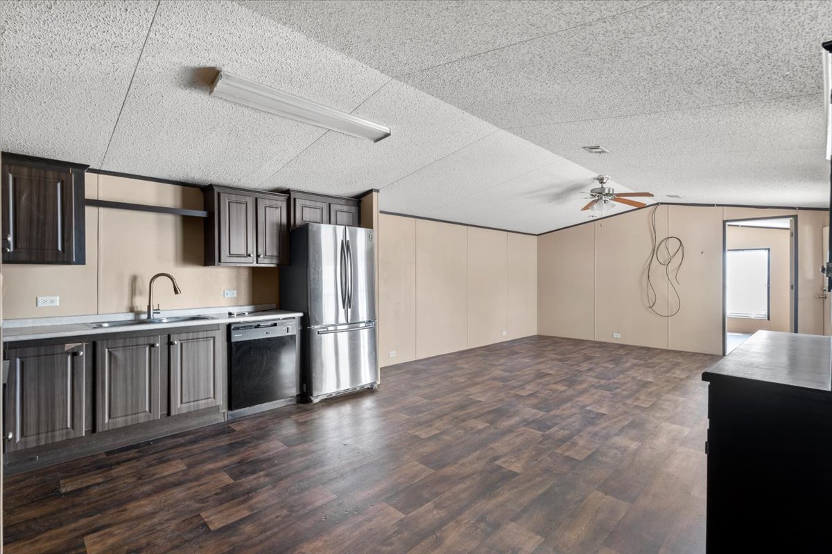 337 Southwest Front Street Bartlett, TX 76511 - Photo 27 of 30 View of open floor plan, from kitchen overlooking dining and living room.