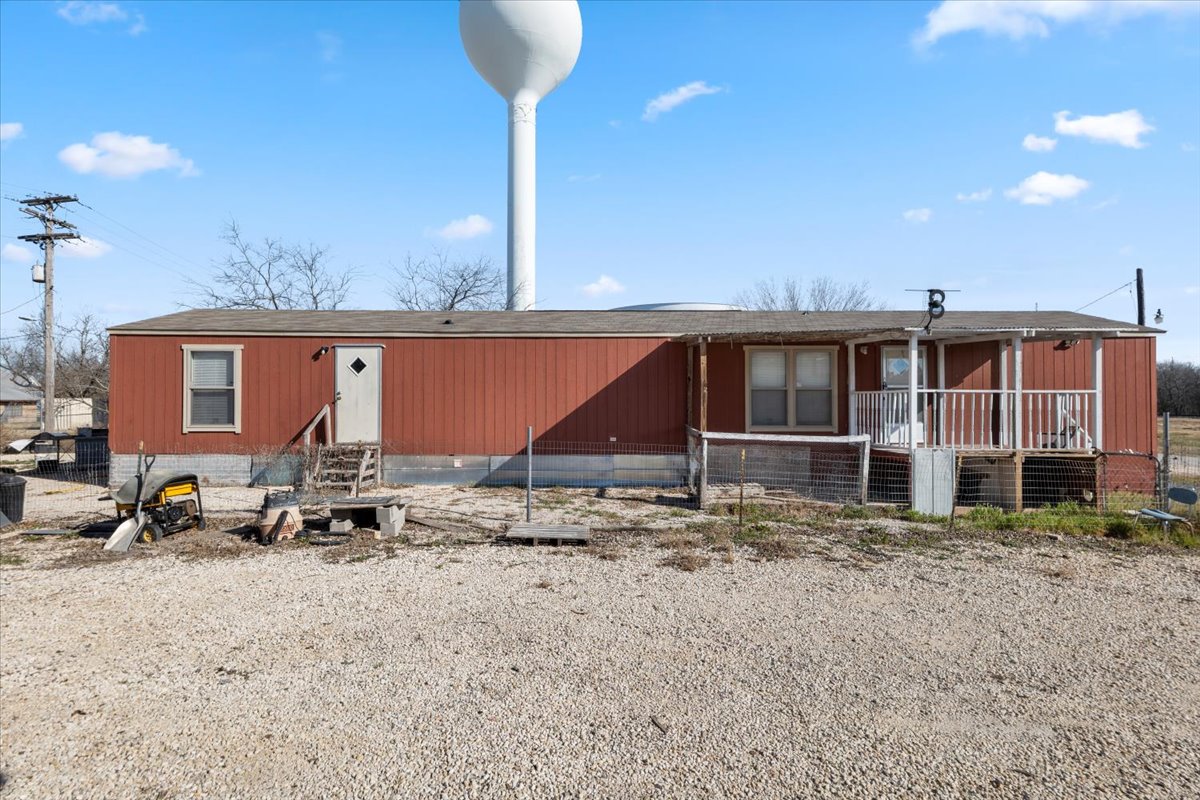 337 Southwest Front Street Bartlett, TX 76511 - Photo 2 of 30 Side view of mobile home.