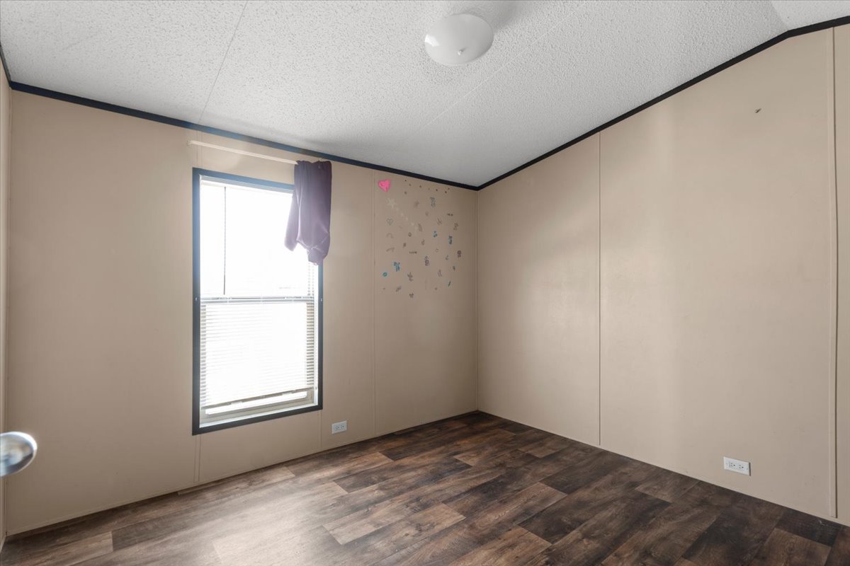 337 Southwest Front Street Bartlett, TX 76511 - Photo 16 of 30 Cute and spacious bedroom.