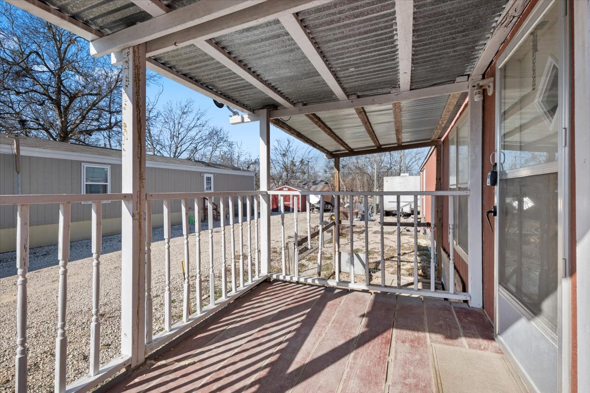 337 Southwest Front Street Bartlett, TX 76511 - Photo 22 of 30 Front porch patio, nice size, great and ready to enjoy.