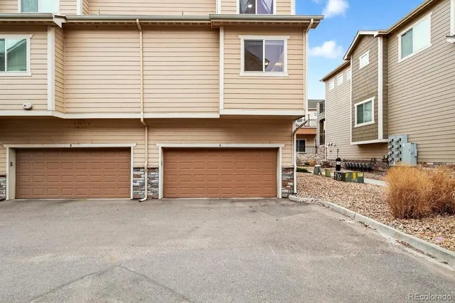 a view of a house with a garage