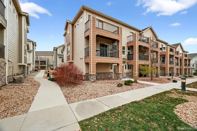 a front view of a building with street view