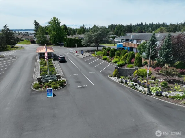 a room with pool table and glass door