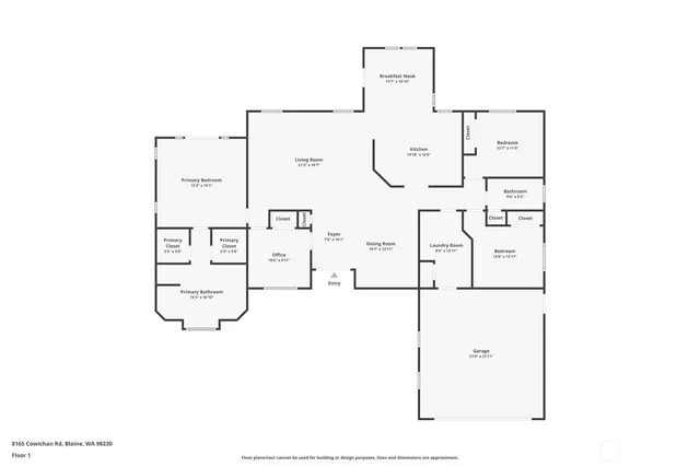 an aerial view of a house with a yard and lake view