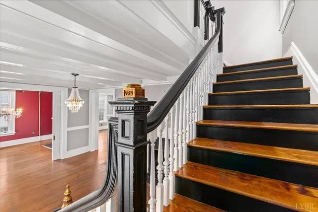 a view of a hallway view with wooden floor