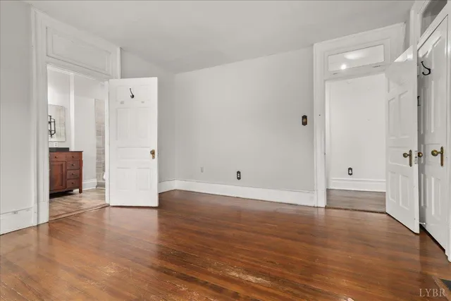 a kitchen with a sink and a refrigerator