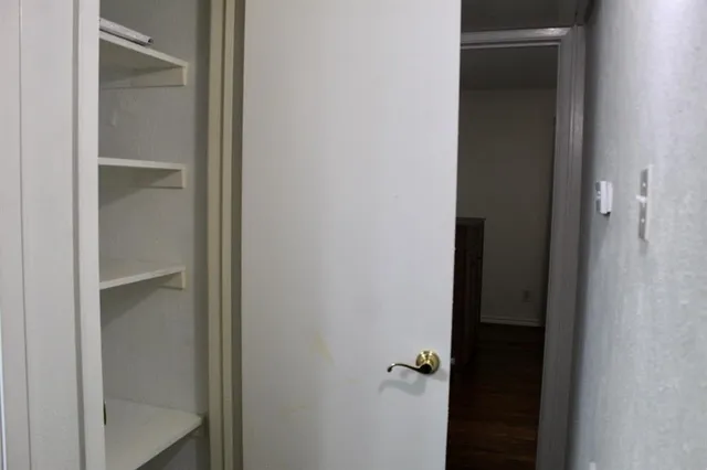 a bathroom with a glass door