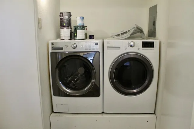 a utility room with dryer and washer