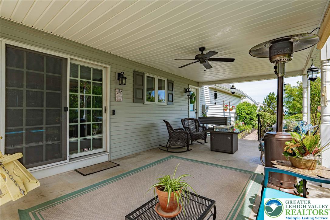 4542 Springfield Drive Coplay, PA 18037 - Photo 63 of 89 An inviting covered patio features ample room for leisure and outdoor entertaining.